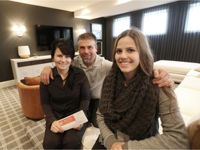 SASKATOON, SASK. NOV. 6, 2015-Hospital Home Lottery House on November 6, 2015 in Saskatoon with winners from left to right Renee, Dennis and Presley Kuntz. {RICHARD MARJAN/The StarPhoenix}
