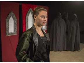 Kate Herriot performs as Macbeth in Embrace Theatre's presentation of the play at AKA Gallery.
