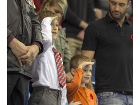 Many young families attend Saskatoon's Remembrance Day ceremonies at the SaskTel Centre.