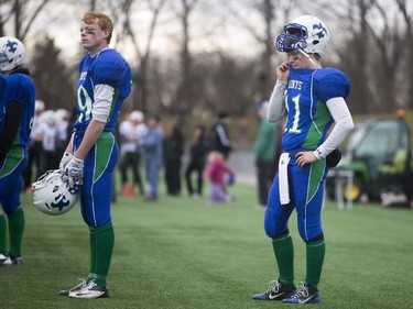 Saskatoon Bishop Mahoney Saints' Brock Matzner reacts to his team losing to the Moose Jaw Peacock Tornadoes in 3A Football Provincial finals at SMS field in Saskatoon, November 14, 2015.