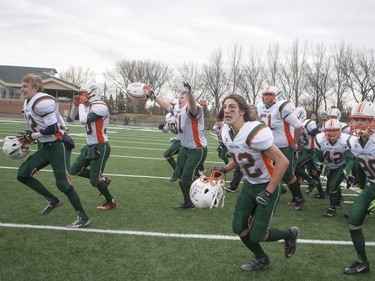 The Moose Jaw Peacock Tornadoes celebrate their victory over the Saskatoon Bishop Mahoney Saints in 3A Football Provincial finals at SMS field in Saskatoon, November 14, 2015.