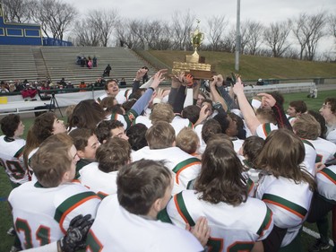 The Moose Jaw Peacock Tornadoes celebrate their victory over the Saskatoon Bishop Mahoney Saints in 3A Football Provincial finals at SMS field in Saskatoon, November 14, 2015.