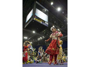 A dancer takes part in the opening ceremonies  during the Federation of Saskatchewan Indian Nations (FSIN) Cultural Celebration and Pow Wow at SaskTel Centre in Saskatoon, November 15, 2015.