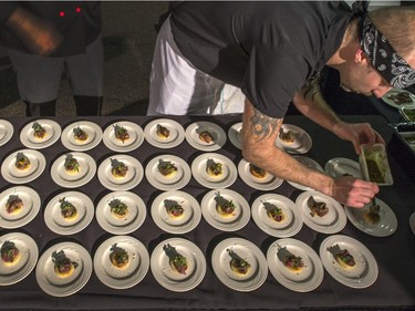 Sabroso's chefs tweaks their meal at the Gold Medal Plates Dinner, Canada's Best Kitchen Party. at Prairieland Centre, November 20, 2015.