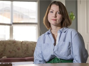 Sarah Vermette, who is deaf, poses for a photograph in her home on Friday, November 27th, 2015.