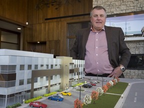 SASKATOON, SASK.; NOVEMBER 26, 2015 - North Prairie Development Ltd. president John Williams with the model of a new  retail and office development  going up in Stonebridge.