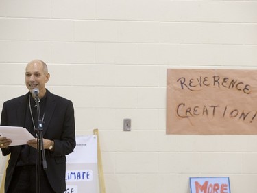 Roman Catholic Bishop Don Bolen speaks during a march and rally for the climate called Saskatoon2Paris, November 29, 2015.