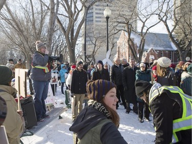 An organizer gives instruction to the crowd during a march and rally for the climate called Saskatoon2Paris, November 29, 2015.