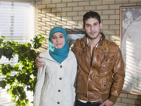 Athar Farroukh, left, and Mohamad Al-Noury at the Global Gathering Place on Monday, November 30th, 2015. The young Syrian couple fled their country after government bombing destroyed their home. They arrived in Canada as refugees in November 2014.