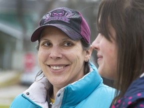 SASKATOON, SASK.; NOVEMBER  5, 2015 - 1006 busfare1 -Tammy Jensen with the help of teaching intern Stephanie Fernandez is approaching Saskatoon's city council in hopes of having bus fares reduced for older aged students like Tammy who is 36 years old, November 5, 2015 (GORD WALDNER/Saskatoon StarPhoenix)