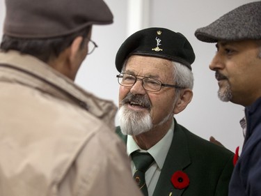 Korean veteran Colin Clay spends time talking to the Muslim community after he spoke at the Bait-ur-Rehmat Mosque for a Muslims Remembrance Day, November 6, 2015.