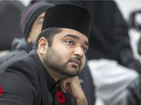 SASKATOON, SASK.; NOVEMBER 6, 2015 - 1107 remembrance - Korean veteran Colin Clay had the attention of Khalid Minhas speaking at the Muslim communities Bait-ur-Rehmat Mosque for a Muslims Remembrance Day, November 6, 2015. (GordWaldner/Saskatoon StarPhoenix)