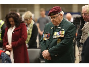 SASKATOON, SK - February 18, 2015 - WWII Veteran Jim McKinny pauses for a moment of silence at the Canada Remembers Our Heroes Air Show press conference at Sgt. Hugh Cairns VC Armoury in Saskatoon on February 18, 2015. (Michelle Berg / The StarPhoenix)