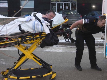 Emergency crews were on scene aiding a man reportedly stabbed multiple times at the Cineplex Theatres in the 300 block of Second Avenue South, February 13, 2015.