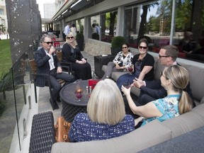 People enjoy the Scarlett patio at the Sheraton Cavalier , Thursday, June 04, 2015.