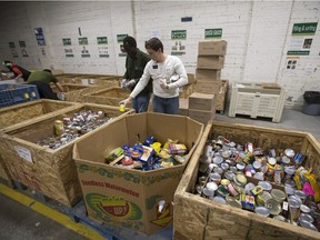 Volunteers sort containers at the Saskatoon Food Bank and Learning Centre, November 17, 2015.