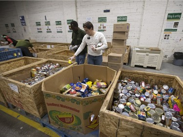 Volunteers sort containers at the Saskatoon Food Bank and Learning Centre, November 17, 2015. The Food Bank kicked off its Tree of Plenty Campaign, which runs until January 15, 2016.