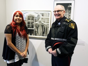 Artist Winona Poochay poses with Police Chief Clive Weighill in front of her creation called No Sleep.