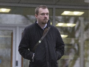 Shawn Rhode leaves Saskatoon Court of Queen's Bench on Nov. 3, 2015, during a break in his trial on sexual assault and child pornography charges.