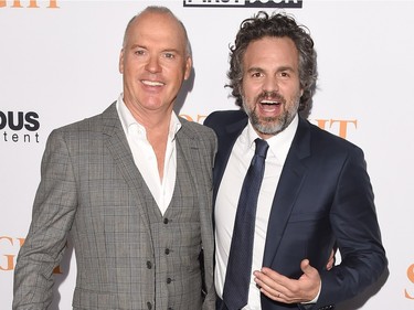 Actors Michael Keaton (L) and Mark Ruffalo arrive at the screening of Open Road Films' "Spotlight" at DGA Theatre on November 3, 2015 in Los Angeles, California.