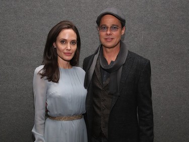 Angelina Jolie (L) and Brad Pitt attend an official Academy Screening of "By the Sea," hosted by The Academy of Motion Picture Arts and Sciences on November 3, 2015 in New York City.