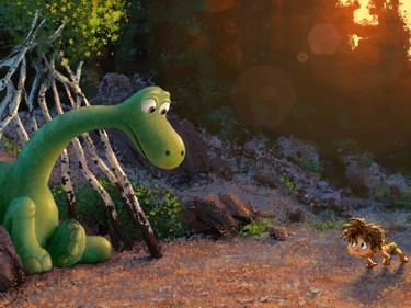 Arlo, voiced by Raymond Ochoa (L) and Spot, voiced by Jack Bright in  "The Good Dinosaur."