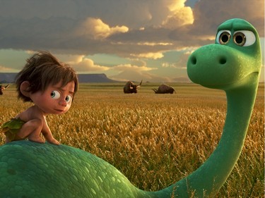 Spot, voiced by Jack Bright (L) and Arlo, voiced by Raymond Ochoa, in  "The Good Dinosaur."