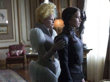 Elizabeth Banks as Effie Trinket (L) and Jennifer Lawrence as Katniss Everdeen in "The Hunger Games: Mockingjay - Part 2."