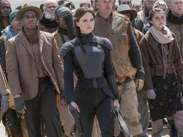 Jennifer Lawrence stars as Katniss Everdeen (C) in "The Hunger Games: Mockingjay - Part 2."