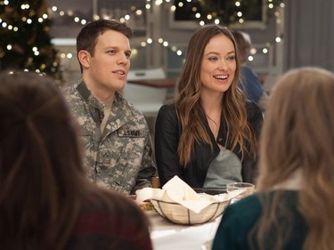 Jake Lacy stars as Joe and Olivia Wilde stars as Eleanor in "Love the Coopers," released by CBS Films and Lionsgate.