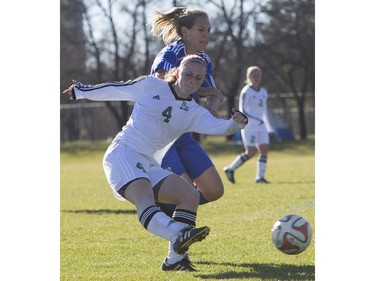 University of Saskatchewan Huskies' Jenelle Zapski kicks the ball against the University of Lethbridge Pronghorns in CIS Women's Soccer playoff action, October 31, 2015.
