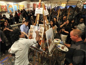 Artists compete in a 2012 art battle in Vancouver. The competition comes to Saskatoon for the first time on Dec. 2, 2015.