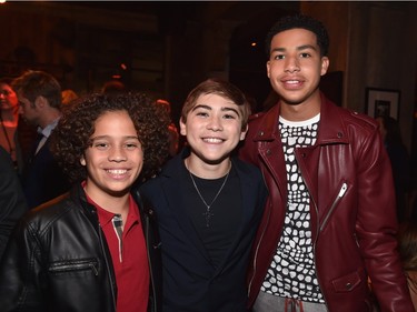 L-R: Jack Bright, Raymond Ochoa, and Marcus Scribner attend the world premiere of Disney-Pixar's "The Good Dinosaur" at the El Capitan Theatre on November 17, 2015 in Hollywood, California.