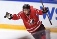 Canada&#039;s Matt Barzal celebrates after scoring against the United States during second period preliminary hockey action at the IIHF World Junior Championship in Helsinki, Finland, on Saturday, Dec. 26, 2015. THE CANADIAN PRESS/Sean Kilpatrick