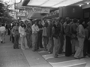 This file photo shows the lineup for the movie Star Wars at the Vogue Theatre on Granville Street in Vancouver.