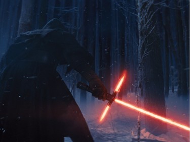 Adam Driver as Kylo Ren with his Lightsaber in "Star Wars: The Force Awakens."