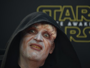 A fan dressed as a Star Wars character arrives at the Australian premier of Star Wars: The Force Awakens in Sydney on December 16, 2015.