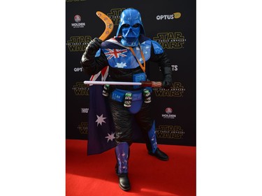 A fan dressed as a Australian Darth Vader arrives at the Australian premier of Star Wars: The Force Awakens in Sydney on December 16, 2015.