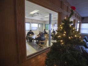 Members of the Saskatoon Fire Department's third battalion inside Fire Hall No. 1 on Christmas morning.