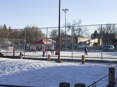 People skate at Winterlude behind Victoria School, December 5, 2015.