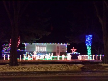 Christmas lights are on display at 210 Taylor Street West in Saskatoon.