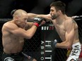 Carlos Condit (right), during a 2012 Ultimate Fighting Championship title bout versus Georges St-Pierre