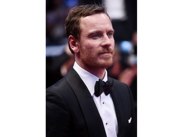 Actor Michael Fassbender leaves the premiere of "Macbeth" during the 68th annual Cannes Film Festival on May 23, 2015 in Cannes, France.