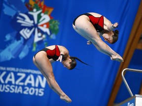 Canada's silver medalists Meaghan Benfeito and Roseline Filion compete during the women's synchronized 10m platform diving final at the World Championships in Kazan, Russia in July, 2015.