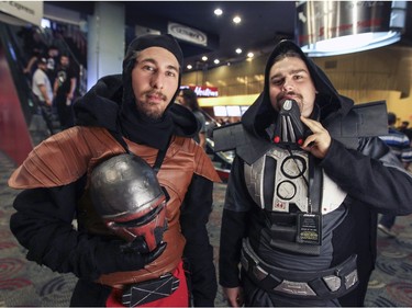 Maxime Legros, left, came to the Star Wars marathon at the Scotiabank Theatre in Montreal Thursday December 17, 2015 dressed as dark Raven while his friend Pierre-Alexandre Lafrance dressed as Darth Malgus.  The two characters are from Star Wars video games, not the movies.