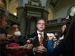 Saskatchewan Premier Brad Wall speaks in the legislative building rotunda on asking the federal government to suspend the current plan to bring 25,000 Syrian refugees into the country. In a letter penned to Prime Minister Justin Trudeau, Wall says, "I am concerned that the current date-driven plan could severely undermine the refugee screening process." Photo taken in Regina, SK on November 16, 2015.