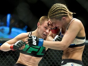 Rose Namajunas connects to the head of Paige VanZant (right) during UFC Fight Night in Las Vegas on Dec. 10, 2015.