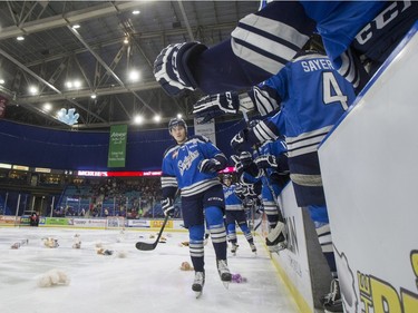 Teddy bears fly though the air as the Saskatoon Blades celebrate their first goal against the Kelowna Rockets during first period WHL action, December 19, 2015.