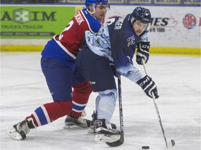 Saskatoon Blades 16-year-old forward Cameron Hausinger (right) is being moved up to the third line.