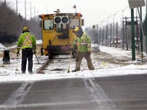 SASKATOON, SASK.--DEC. 11 1212--CN Rail workers were busy clearing ice and snow from the tracks at Warman Road and 33rd Street onDecember 11, 2015 in Saskatoon. (RICHARD MARJAN /The StarPhoenix)